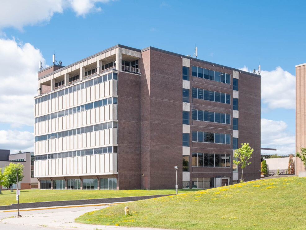 Exterior of a modernist brick library.