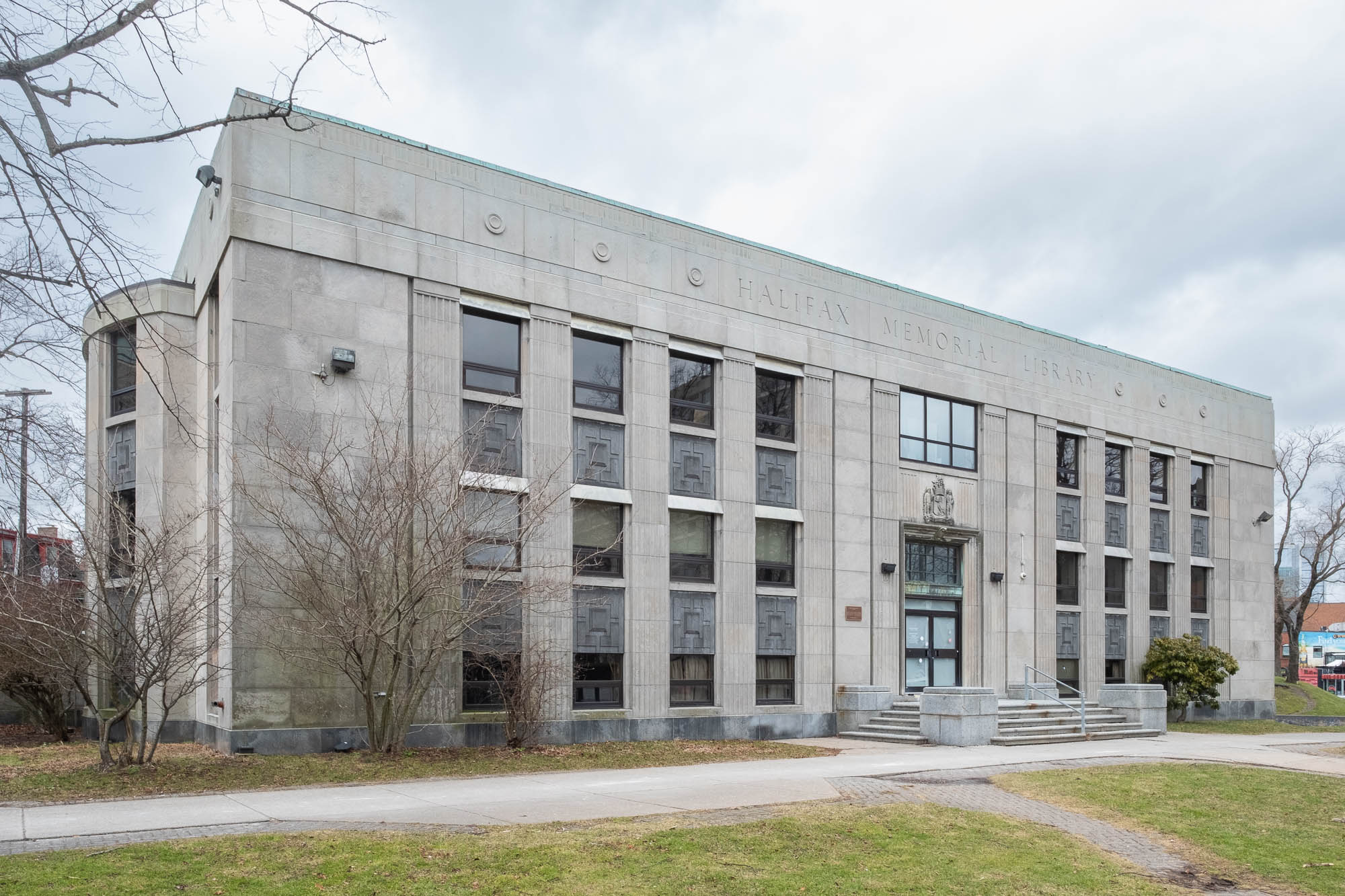 Exterior of a neoclassical library, with the words "Halifax Memorial Library" written on the frontispice.