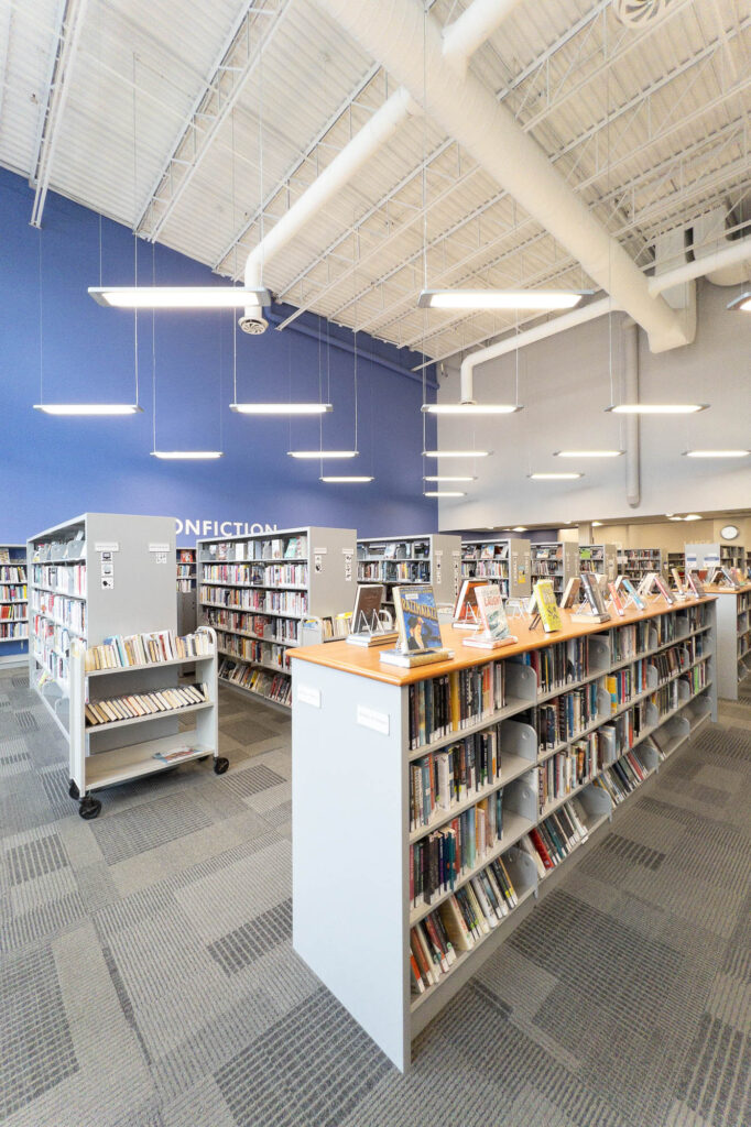 Interior of a contemporary library with bookshelves.