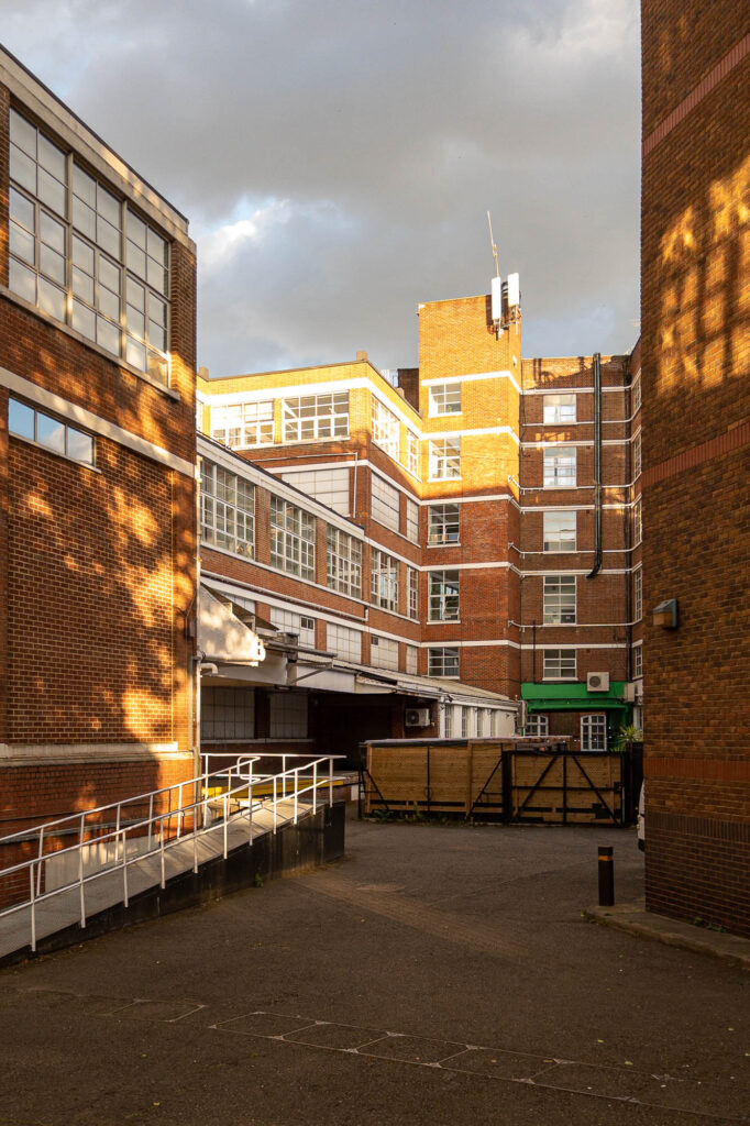 Exterior of a modern brick industrial complex.